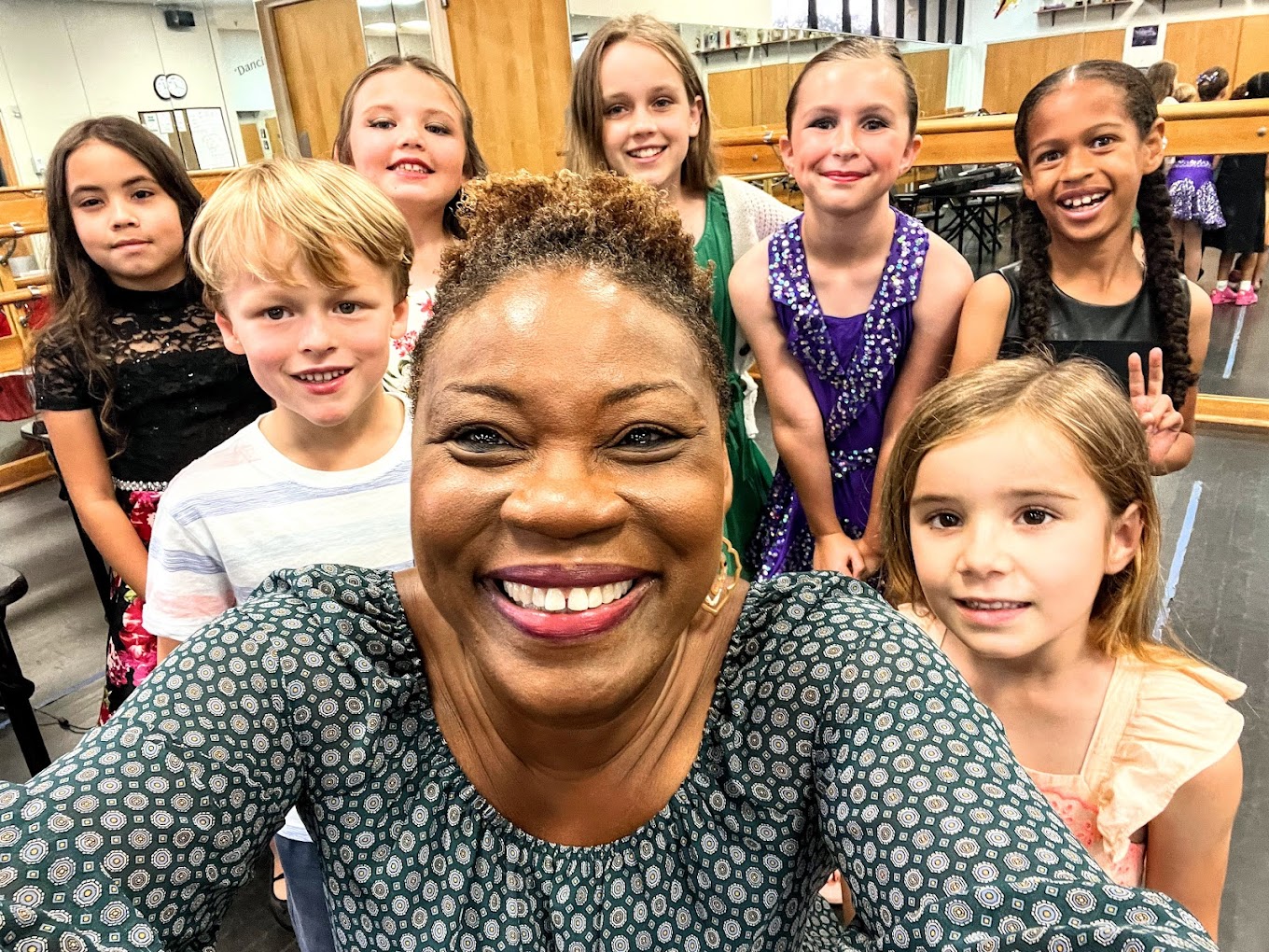 Music teacher Vivia Taylor with students in a music class