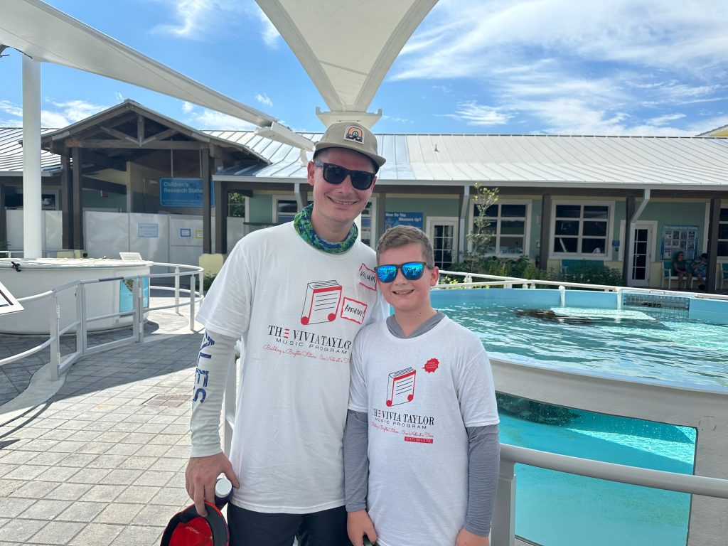 A music student and his father at the Loggerhead Marinelife Center.