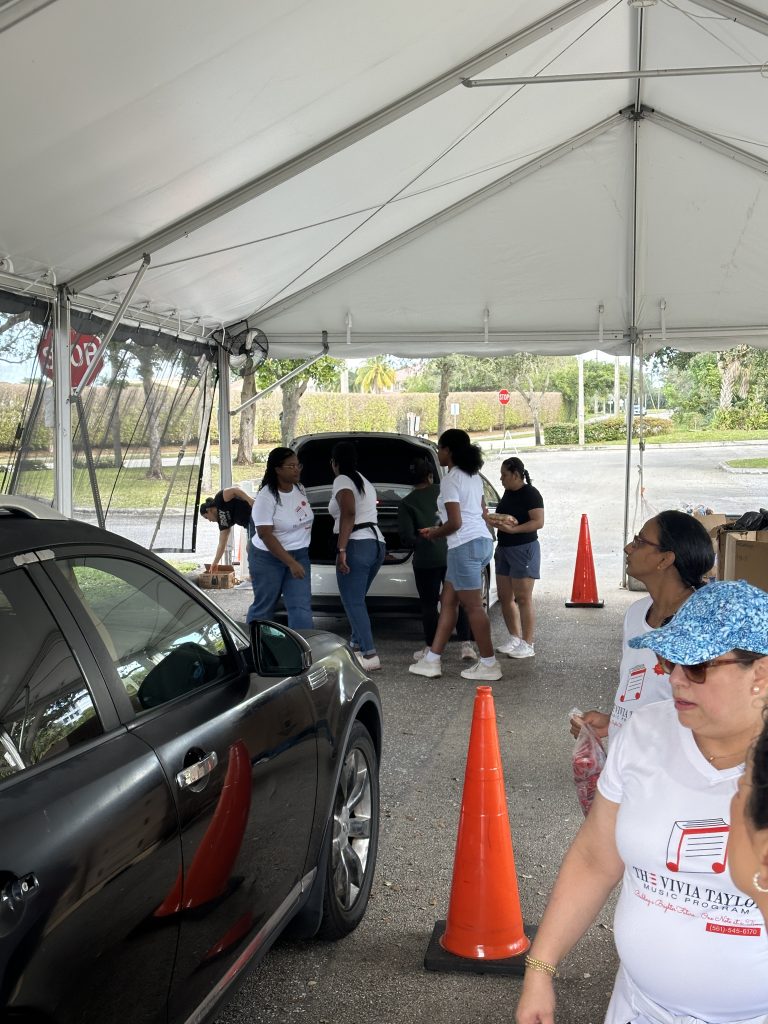 Music students and family members volunteering for Feed the Hungry